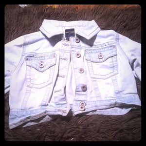 A blue jean cropped jacket